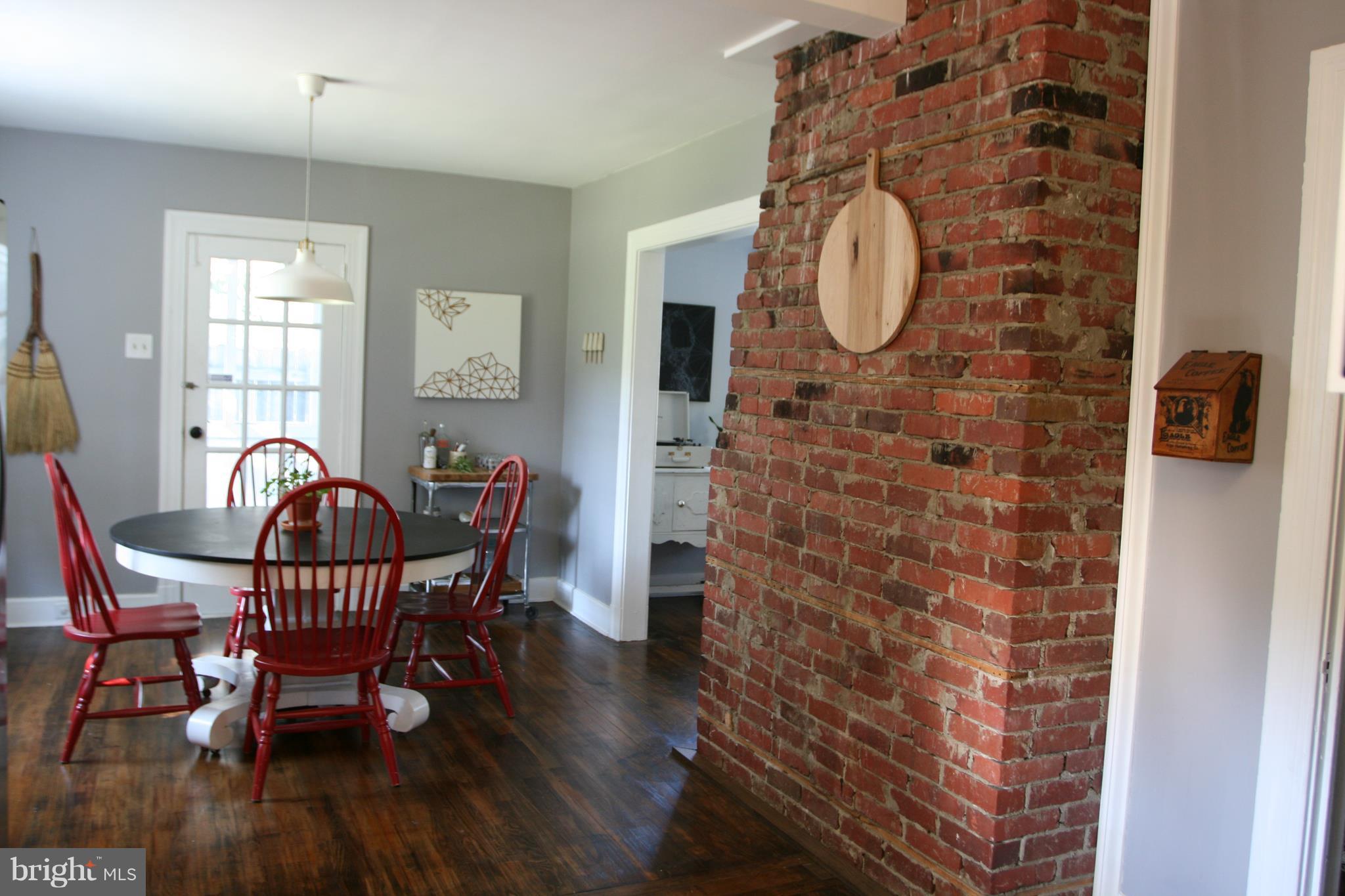 1804 Bay Ridge Avenue Annapolis, MD 21403 - Photo 16 of 26 a view of a dining room with furniture and wooden floor