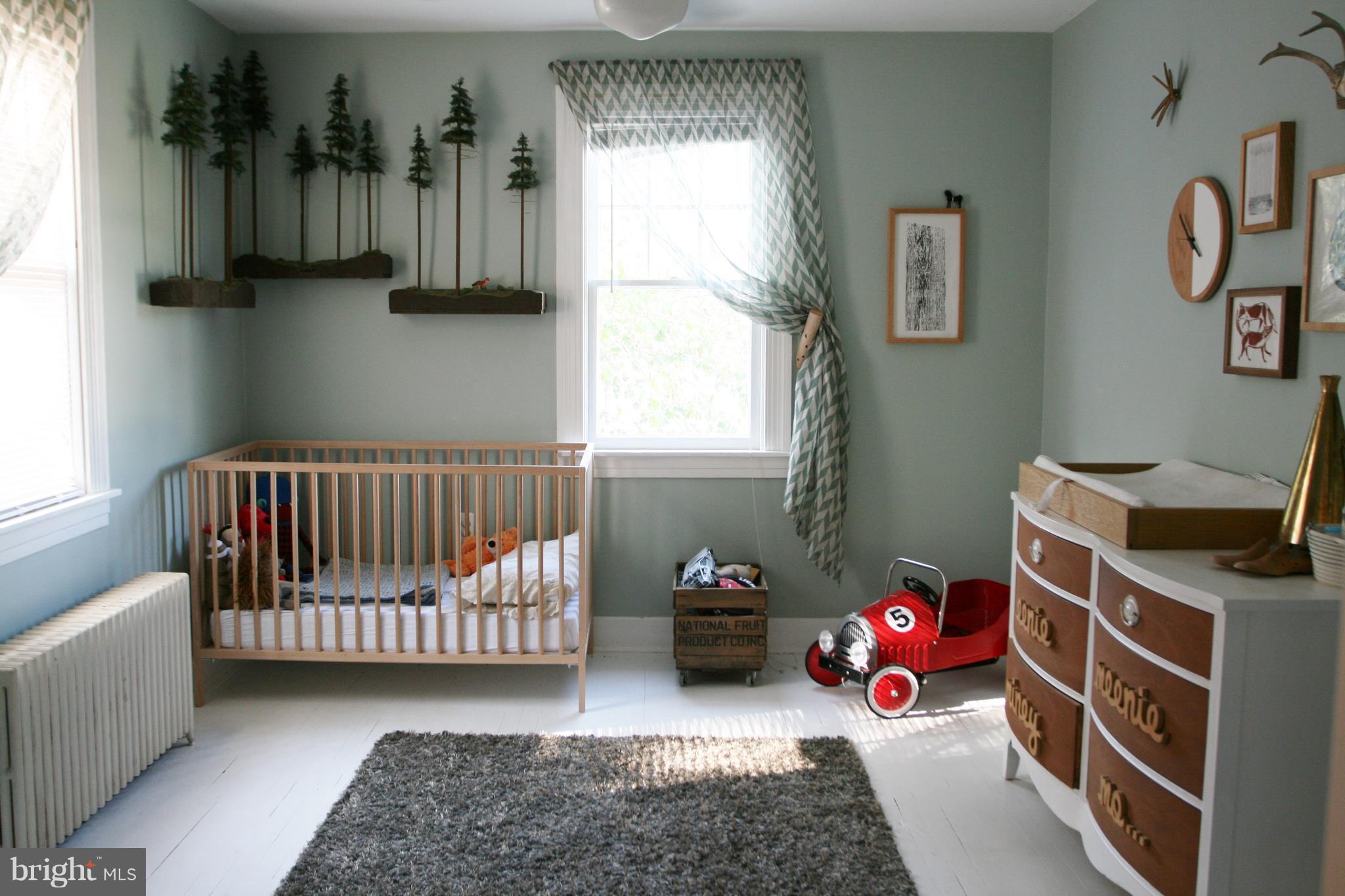 1804 Bay Ridge Avenue Annapolis, MD 21403 - Photo 20 of 26 a bedroom with a bed and a window