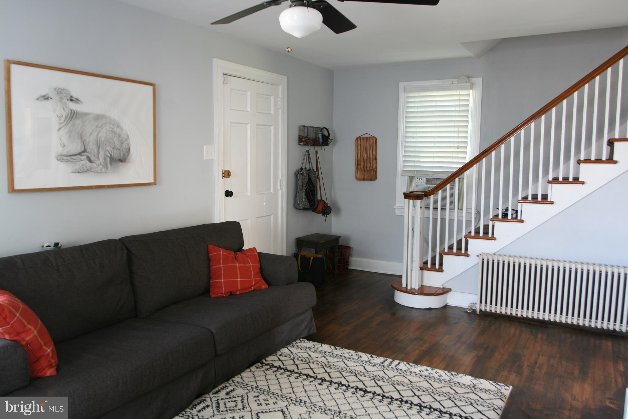 1804 Bay Ridge Avenue Annapolis, MD 21403 - Photo 7 of 26 a living room with furniture and wooden floor
