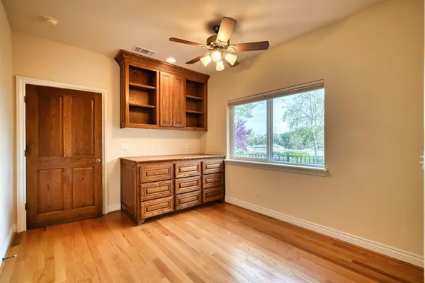 a kitchen with stainless steel appliances granite countertop a stove and a refrigerator