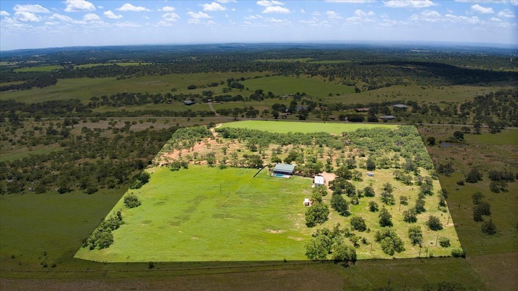 6446 Blackjack Road Fredonia, TX 76842 - Photo 45 of 48 a view of a lake with a yard
