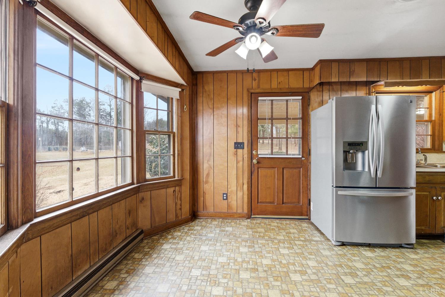 1730 Redfields Road Appomattox, VA 24522 - Photo 16 of 53 a view of an empty room with a kitchen
