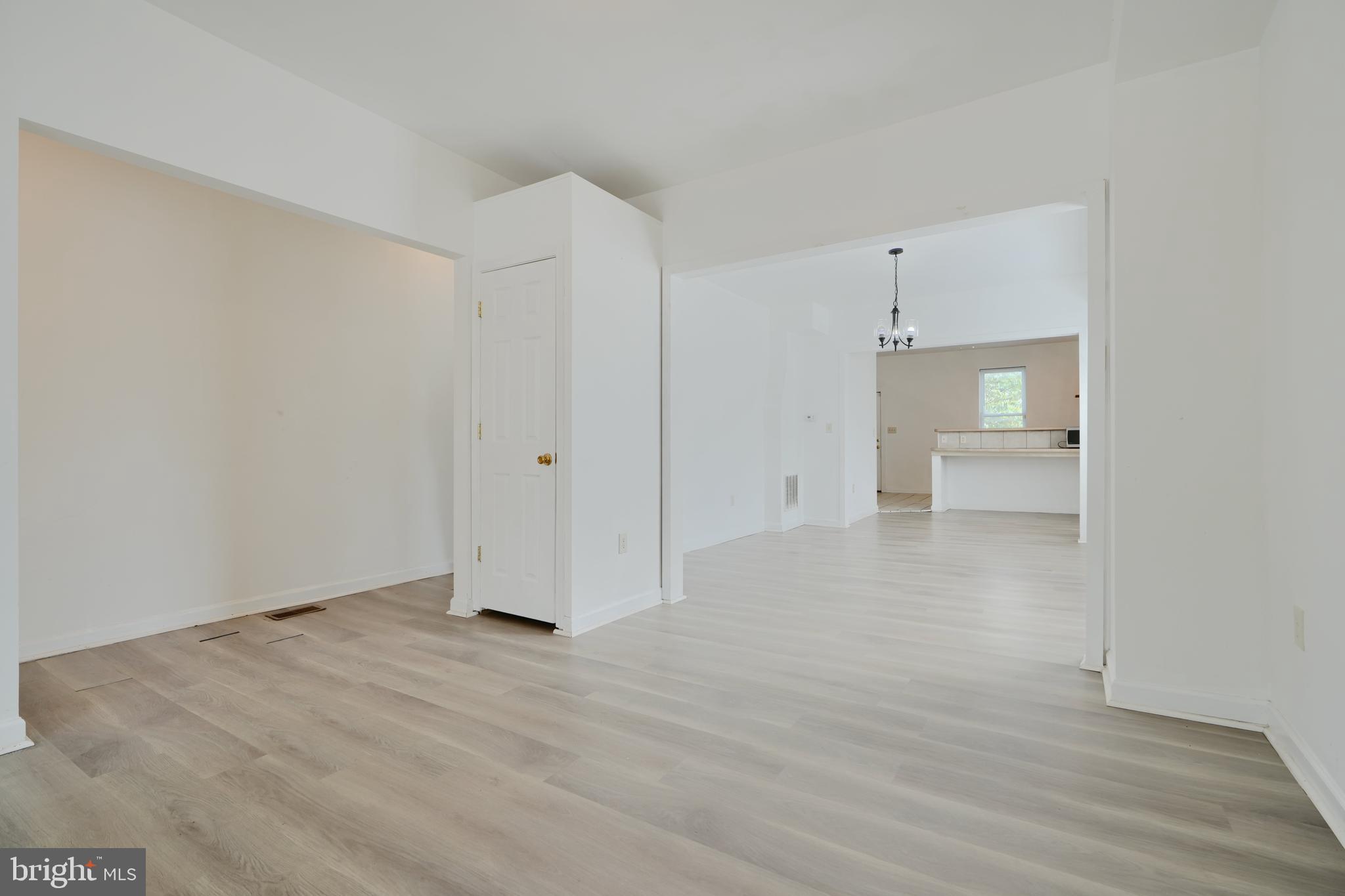 2251 Annapolis Road Baltimore, MD 21230 - Photo 3 of 13 a view of empty room with wooden floor