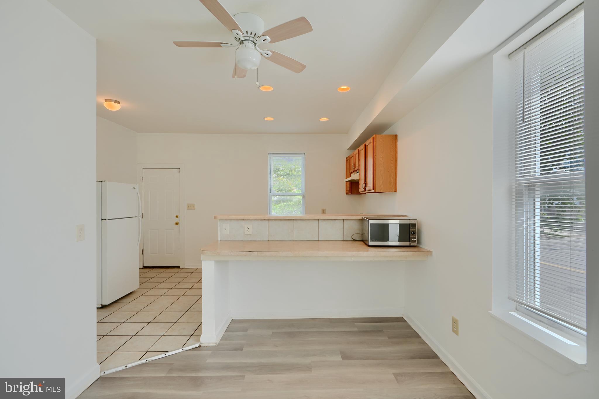 2251 Annapolis Road Baltimore, MD 21230 - Photo 5 of 13 a view of a kitchen with a sink and cabinet area