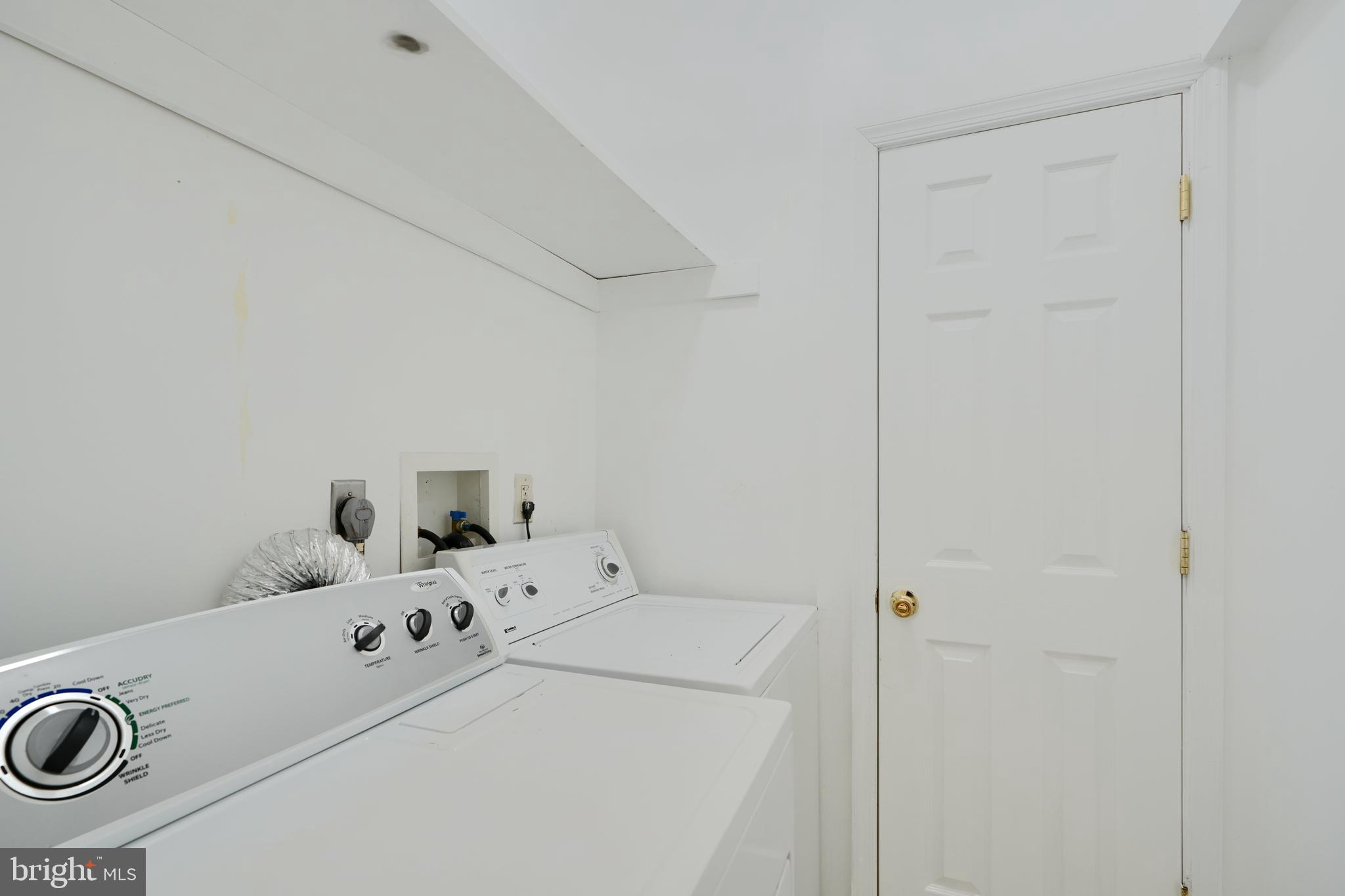 2251 Annapolis Road Baltimore, MD 21230 - Photo 9 of 13 a room with a baby crib and a dresser