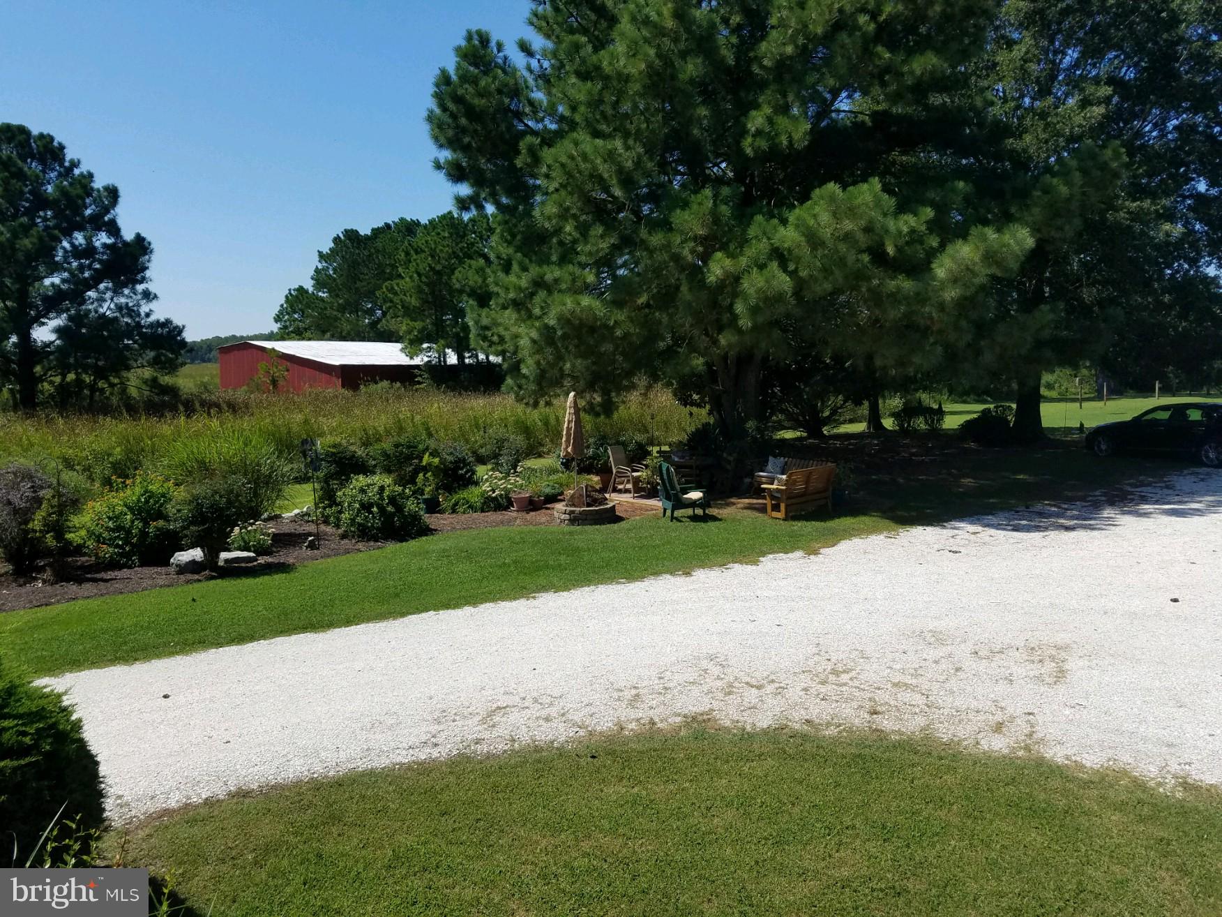 122 Hickory Point Road Pocomoke City, MD 21851 - Photo 3 of 18 Meditation area in the shade behind home.