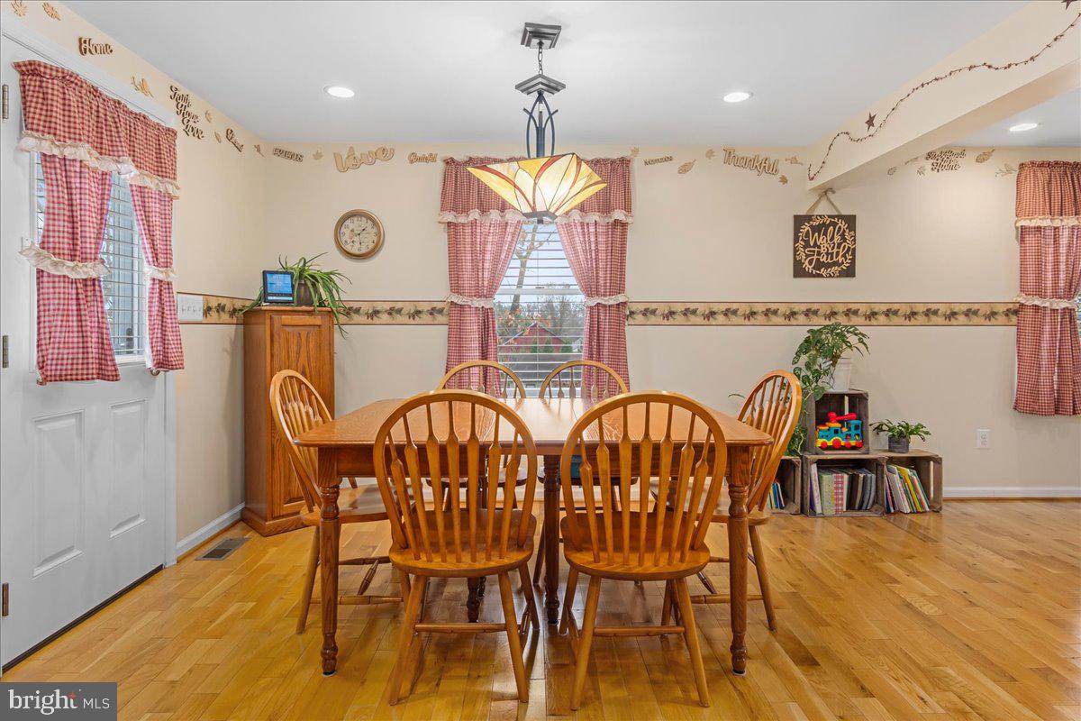 11701 Walnut Point Road Hagerstown, MD 21740 - Photo 22 of 56 a dining room with furniture and window