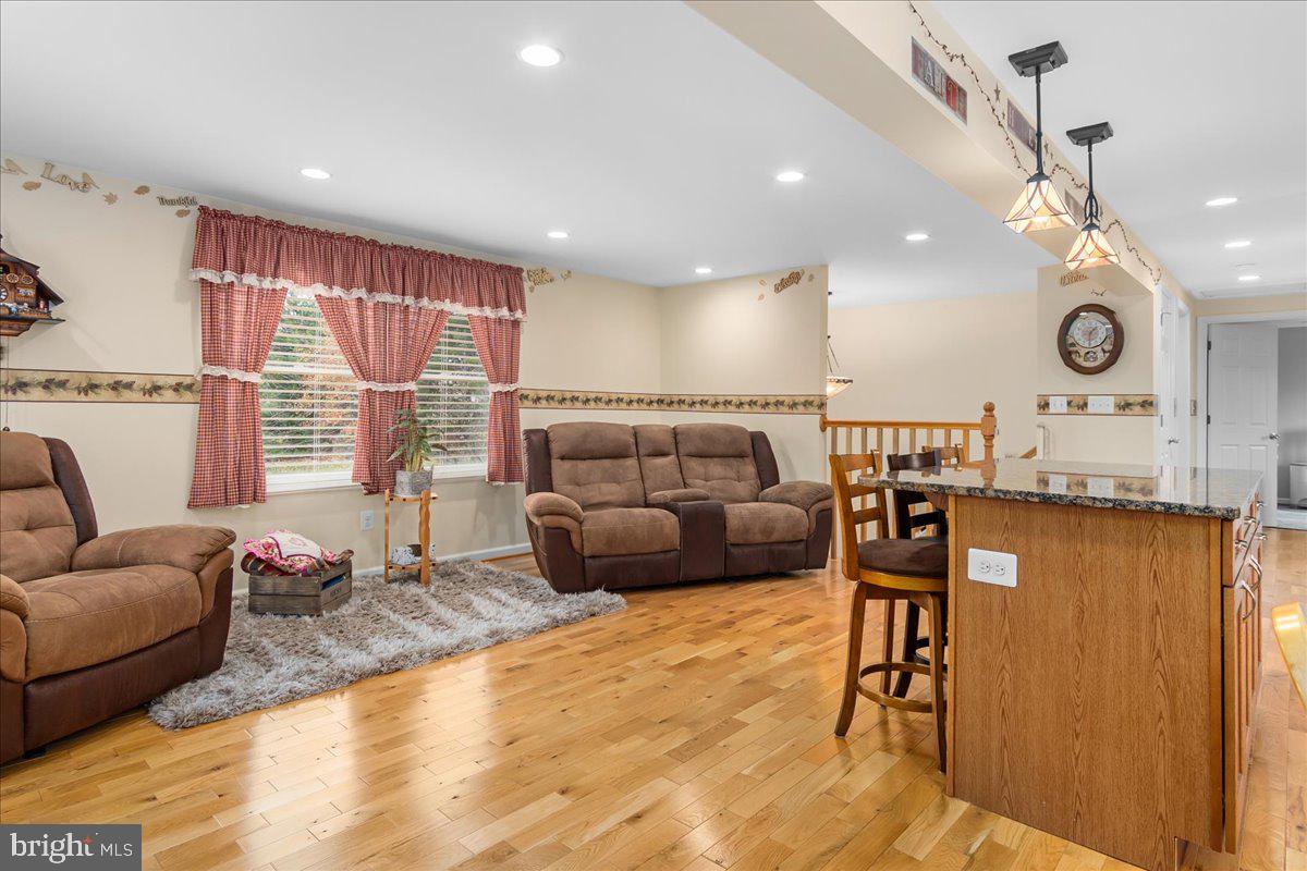 11701 Walnut Point Road Hagerstown, MD 21740 - Photo 23 of 56 a living room with furniture and a large window