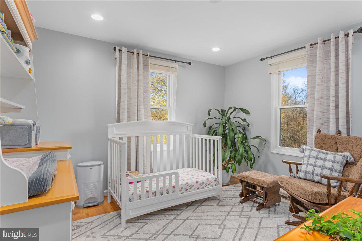 11701 Walnut Point Road Hagerstown, MD 21740 - Photo 26 of 56 a bedroom with furniture and a window