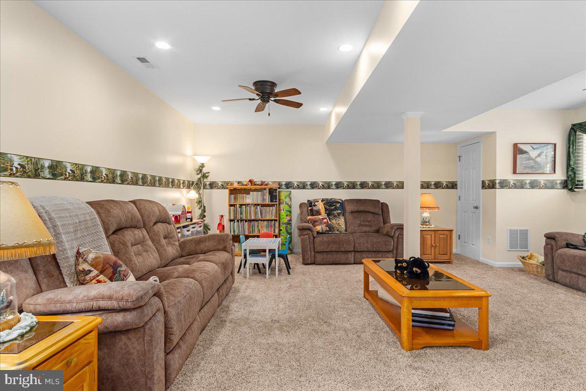 11701 Walnut Point Road Hagerstown, MD 21740 - Photo 29 of 56 a living room with furniture