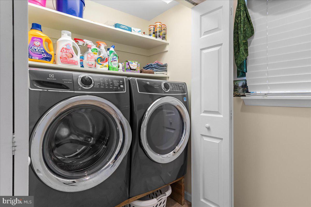 11701 Walnut Point Road Hagerstown, MD 21740 - Photo 37 of 56 a utility room with dryer and washer