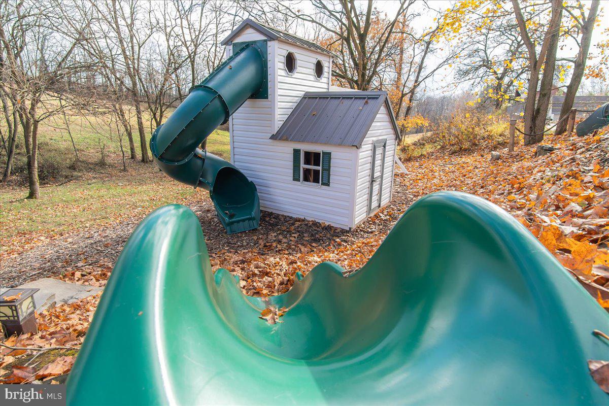 11701 Walnut Point Road Hagerstown, MD 21740 - Photo 41 of 56 a front view of a house with a yard