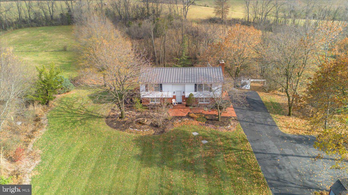 11701 Walnut Point Road Hagerstown, MD 21740 - Photo 44 of 56 a view of a yard with an outdoor space