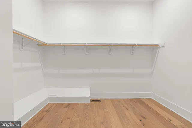 a white bath tub sitting in a bathroom