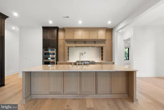 a view of kitchen with wooden floor