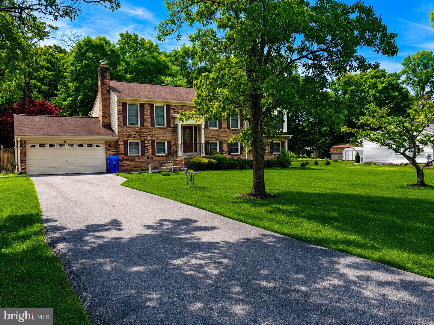 2861 Ridge Road Waldorf, MD 20603 - Photo 1 of 3 Charming brick home with lush greenery.