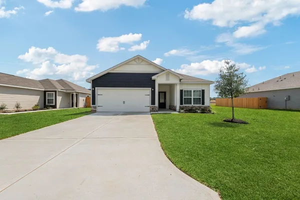 a front view of house with yard