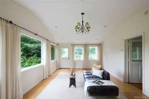 a bathroom with a toilet and a tub