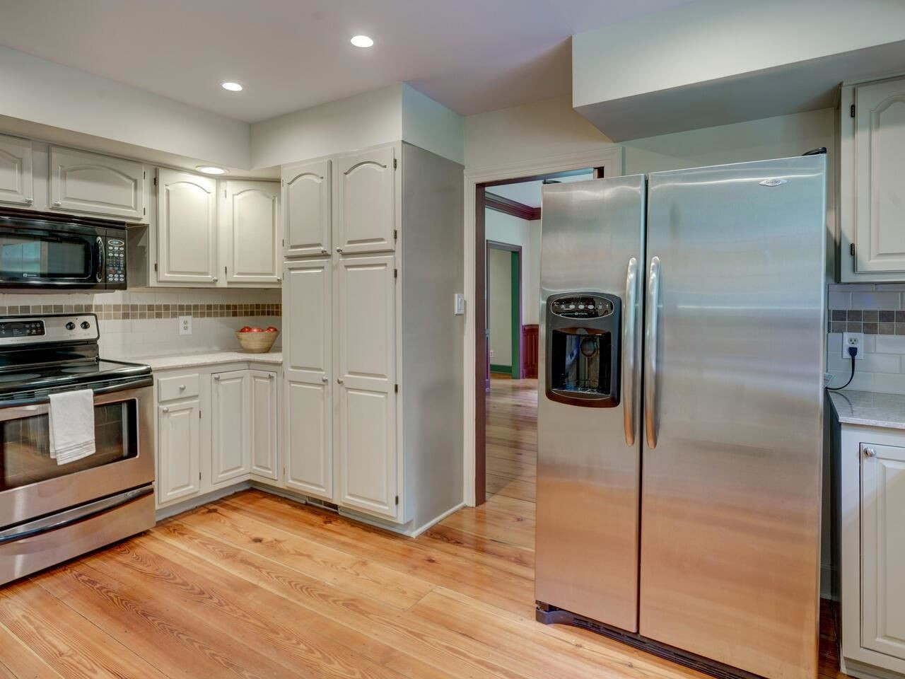 1100 Trail End Road Durham, NC 27712 - Photo 9 of 30 Smooth top range- Solid Surface Countertops