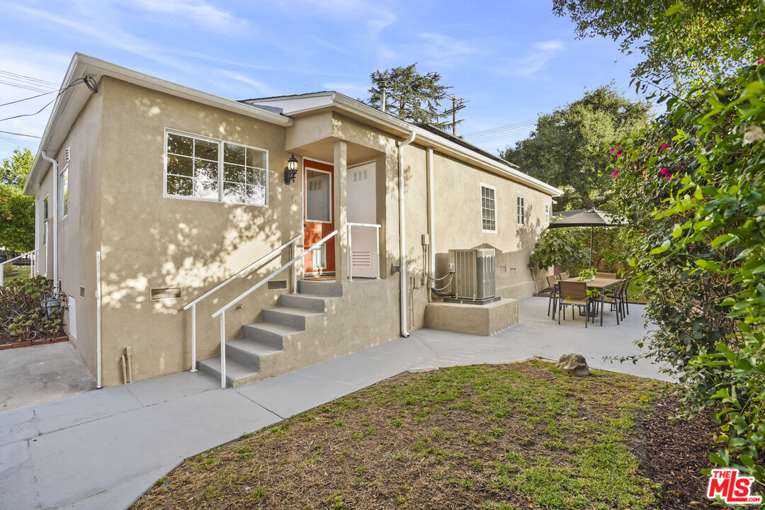 10129 Plainview Avenue Tujunga, CA 91042 - Photo 34 of 51 a view of a house with backyard and sitting area