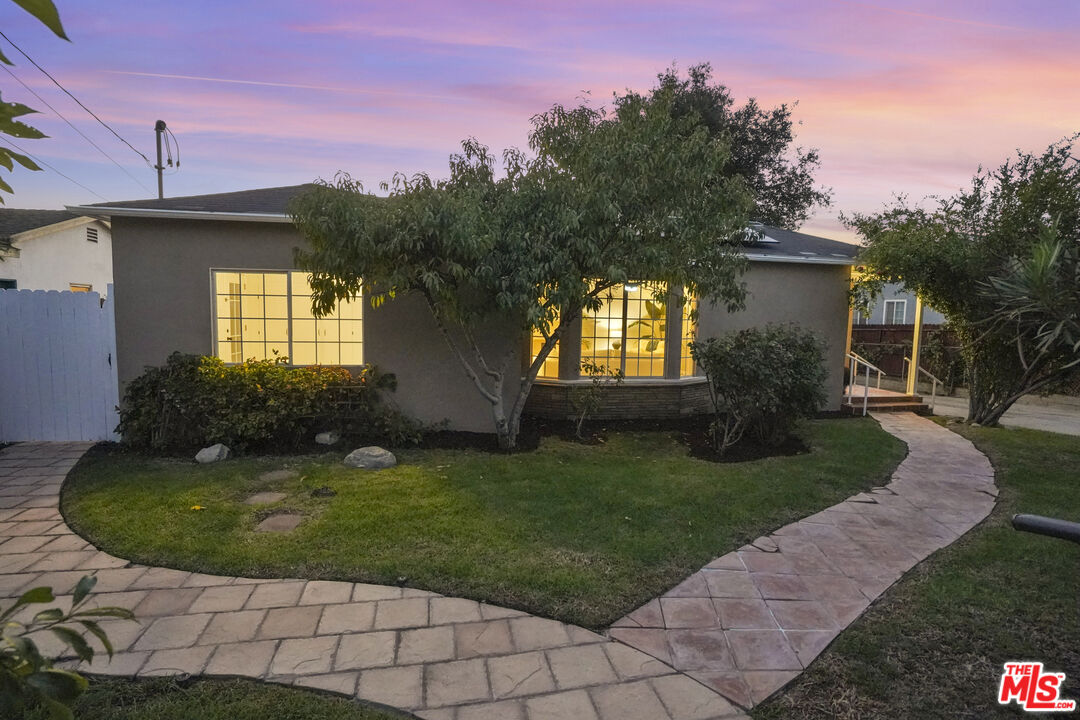 10129 Plainview Avenue Tujunga, CA 91042 - Photo 40 of 51 a view of a house with a backyard