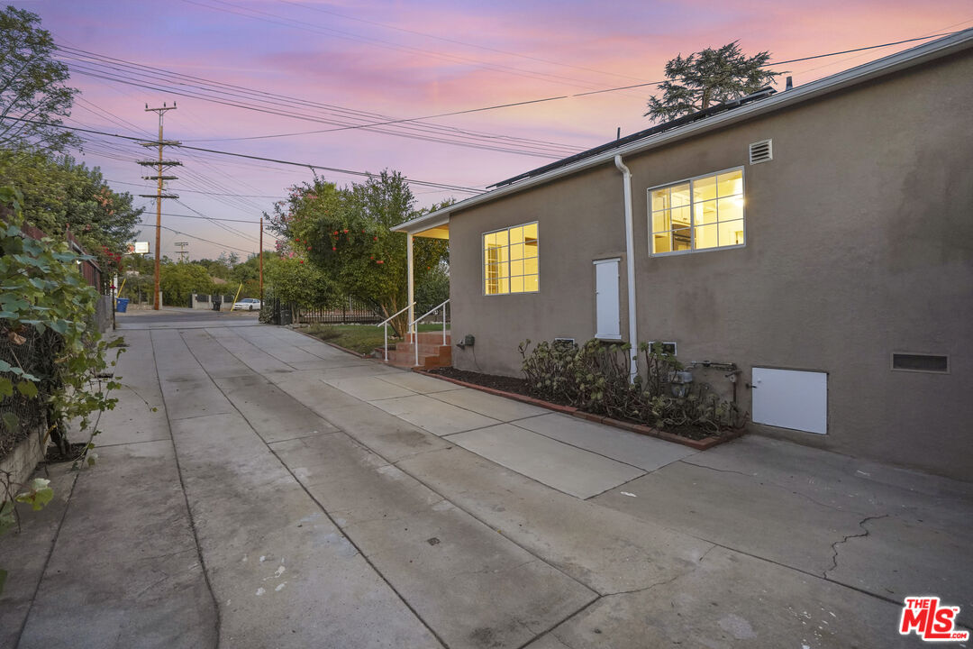 10129 Plainview Avenue Tujunga, CA 91042 - Photo 42 of 51 a house view with a outdoor space