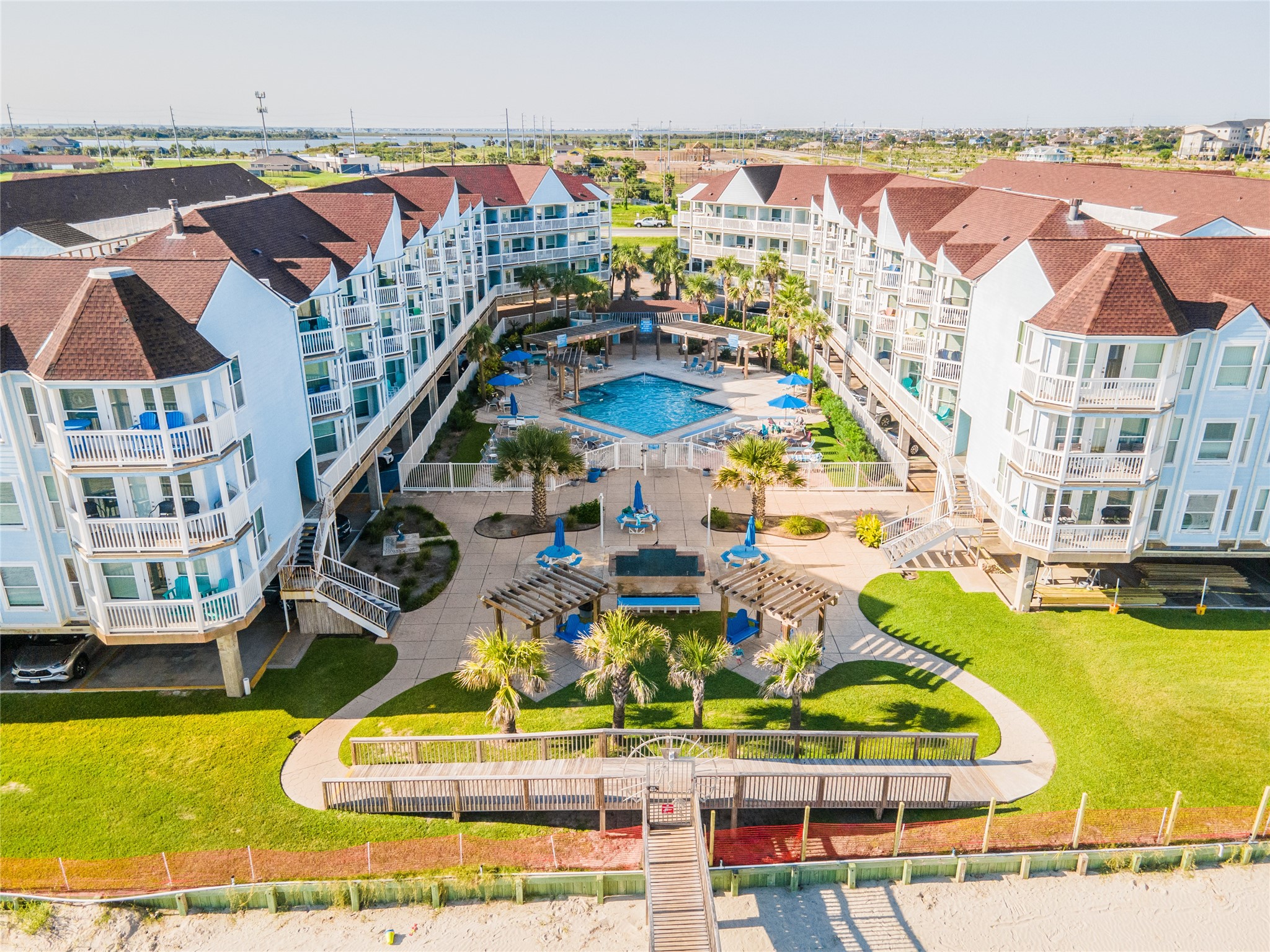10811 Termini-San Luis Pass Road, Unit 2307 Galveston, TX 77554 - Photo 27 of 32 a view of houses with outdoor space