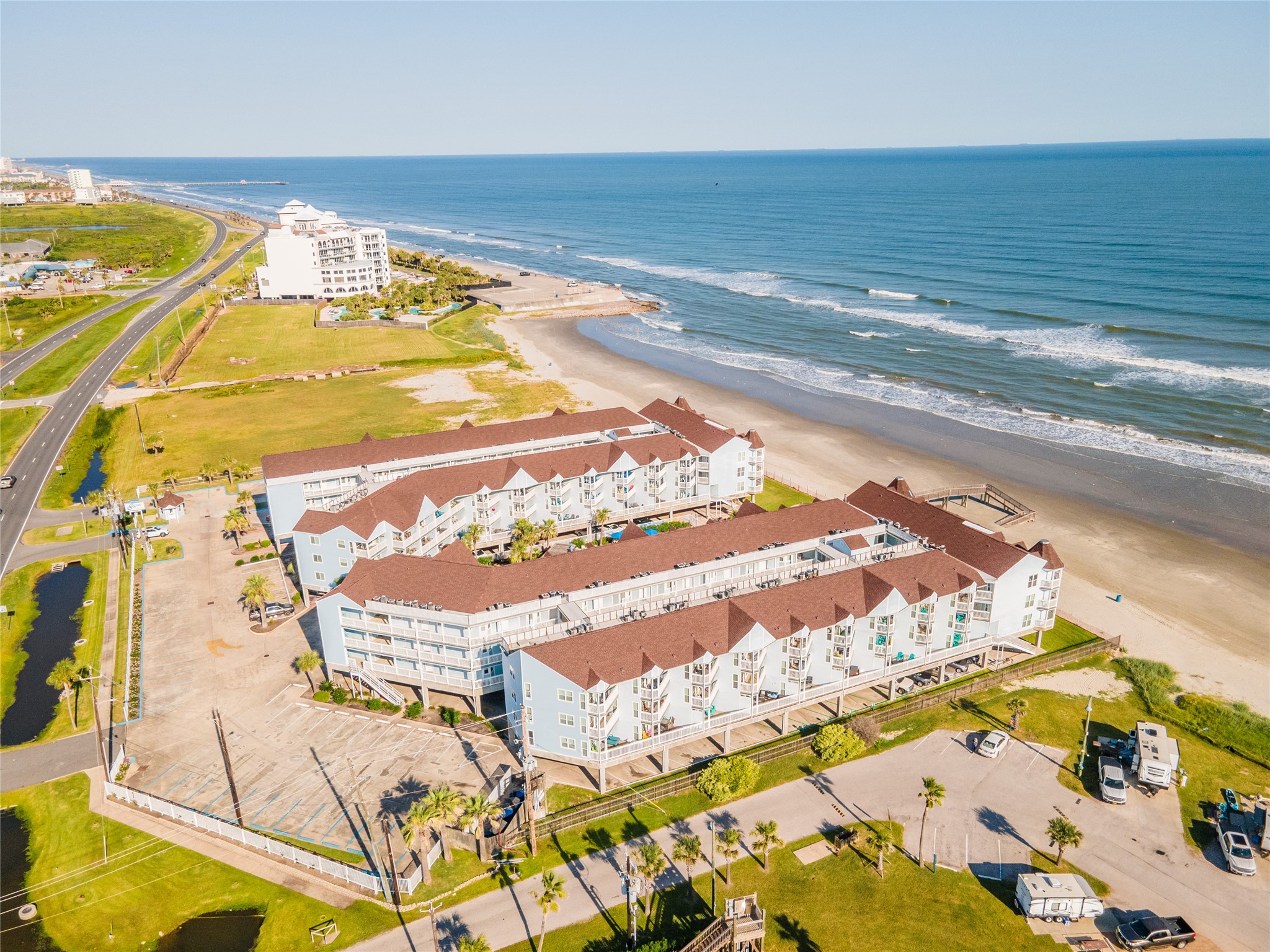 10811 Termini-San Luis Pass Road, Unit 2307 Galveston, TX 77554 - Photo 28 of 32 a view of a swimming pool
