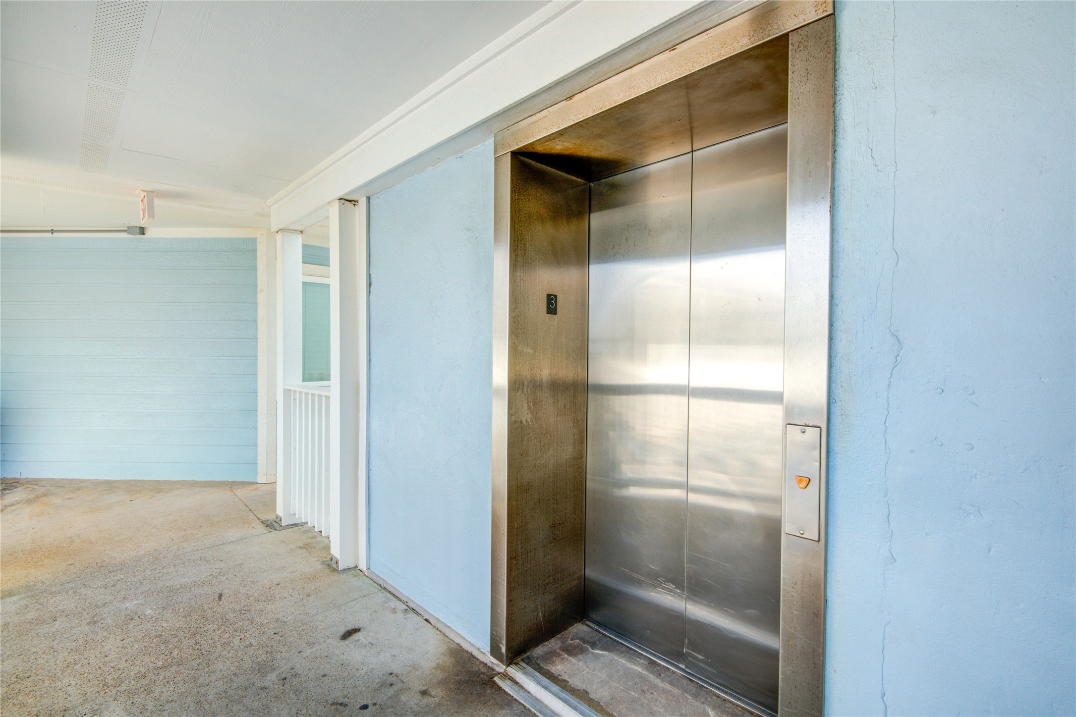 10811 Termini-San Luis Pass Road, Unit 2307 Galveston, TX 77554 - Photo 31 of 32 a bathroom with a glass shower door