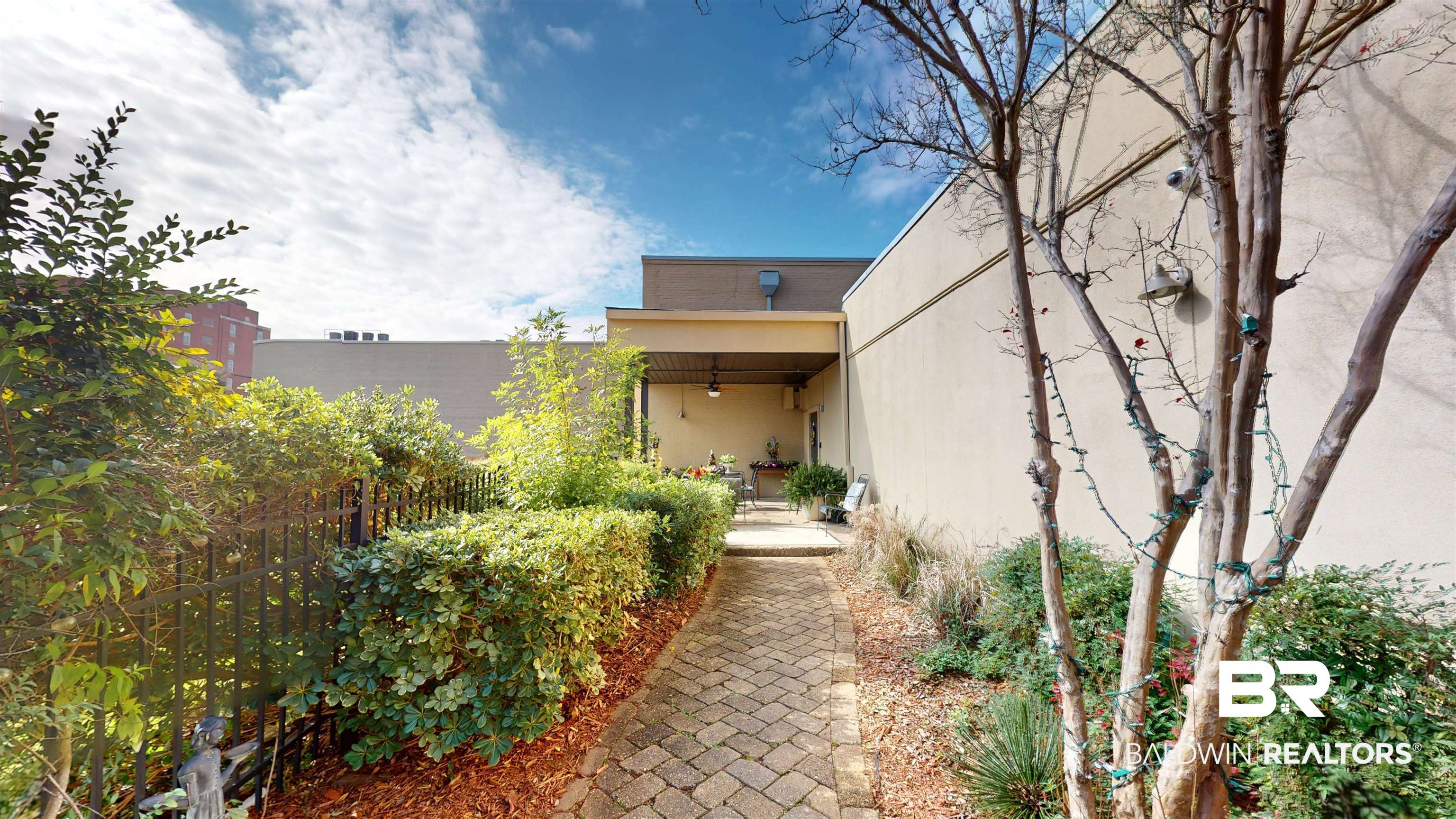 308 St Louis Street, Unit 101 Mobile, AL 36602 - Photo 10 of 30 View of yard with a patio