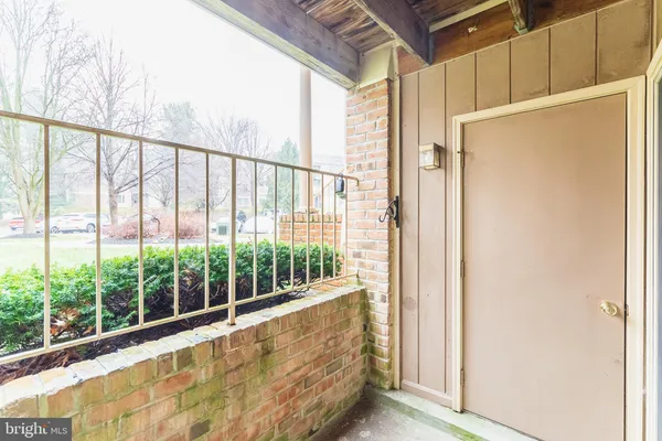 a view of a glass door with a balcony