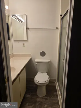 a bathroom with a toilet and a sink