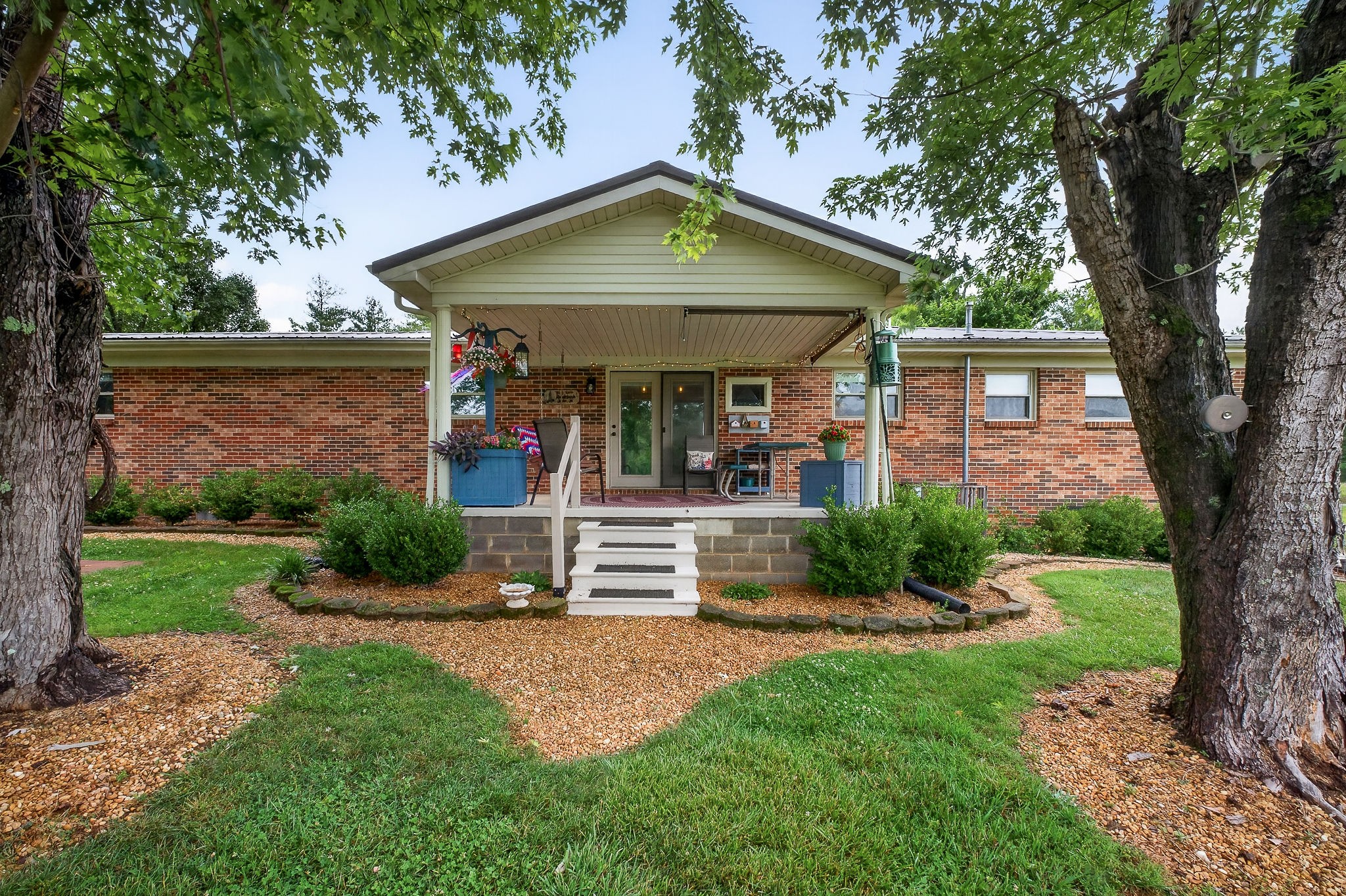 1755 Burgess Falls Road Sparta, TN 38583 - Photo 49 of 56 a front view of a house with garden