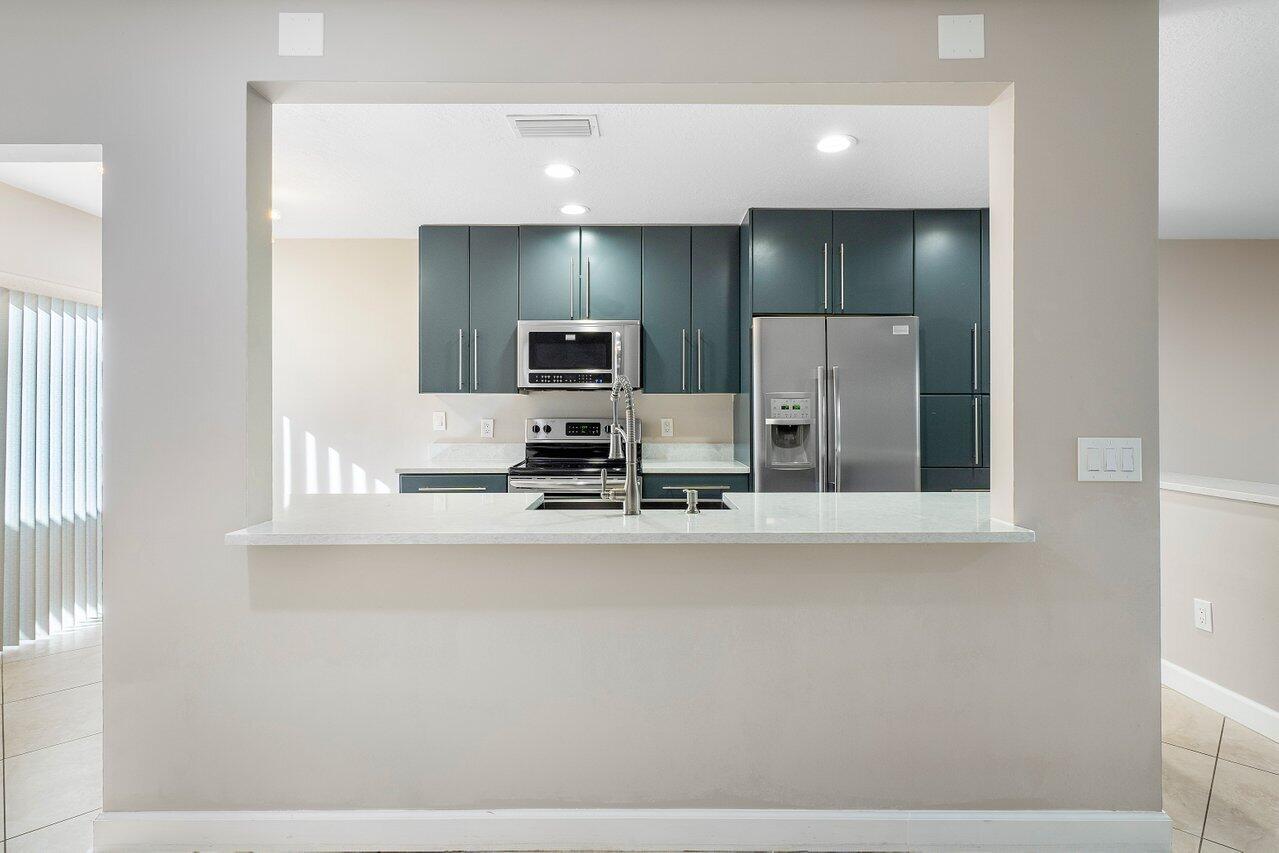 21785 Cypress Drive, Unit 46F Boca Raton, FL 33433 - Photo 6 of 49 008-21785CypressDrive-BocaRaton-FL-33433