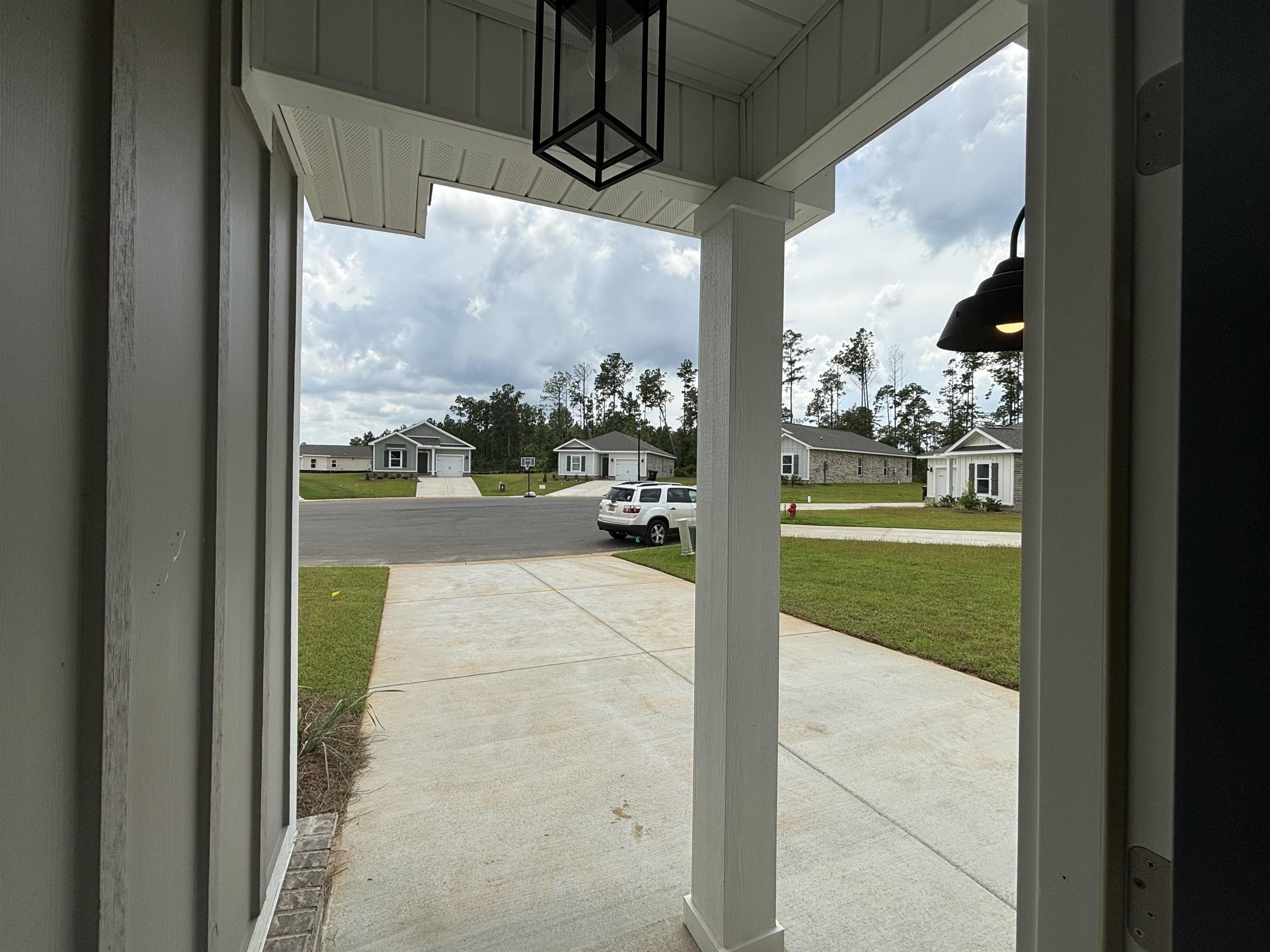 32256 Lexington Drive Daphne, AL 36527 - Photo 7 of 23 Looking From Under Front Patio