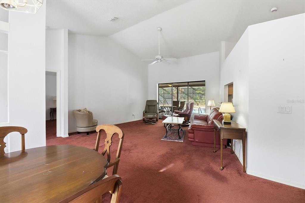 22 Mastic Court West Homosassa, FL 34446 - Photo 13 of 46 a view of a dining room with furniture window and outside view