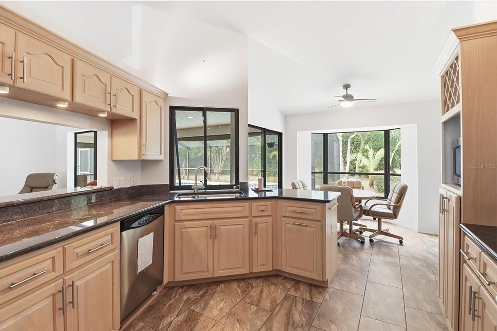 22 Mastic Court West Homosassa, FL 34446 - Photo 17 of 46 a kitchen with a sink and cabinets