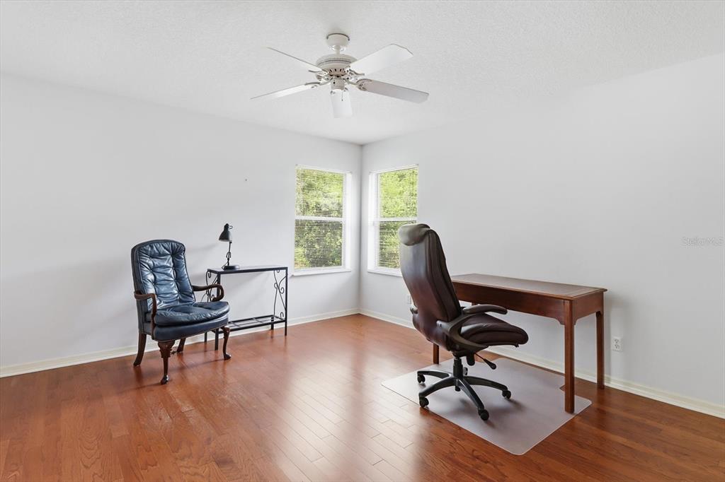 22 Mastic Court West Homosassa, FL 34446 - Photo 30 of 46 a view of a workspace with furniture and a window