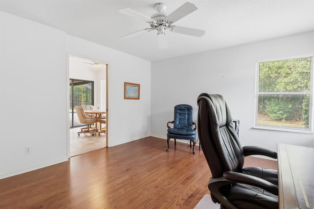 22 Mastic Court West Homosassa, FL 34446 - Photo 32 of 46 a view of a workspace with furniture and a window
