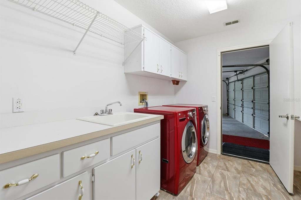 22 Mastic Court West Homosassa, FL 34446 - Photo 33 of 46 a utility room with dryer and washer