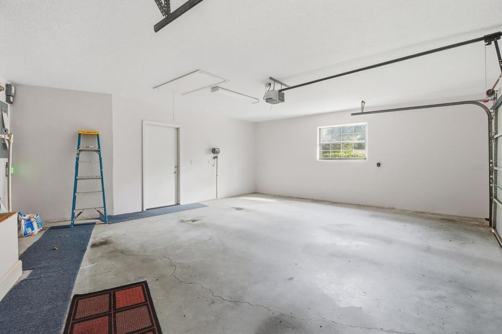 22 Mastic Court West Homosassa, FL 34446 - Photo 35 of 46 a view of empty room with windows