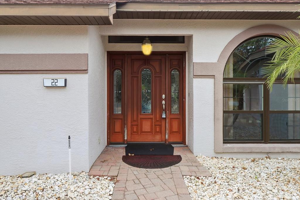 22 Mastic Court West Homosassa, FL 34446 - Photo 6 of 46 a view of a entryway door of the house