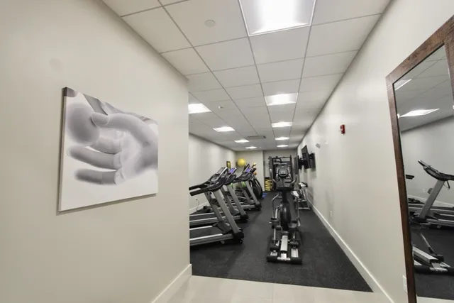 a view of a hallway with workspace
