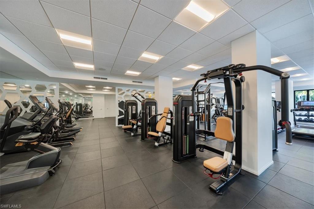 1111 Central Avenue, Unit 401 Naples, FL 34102 - Photo 27 of 36 a view of a room with gym equipment