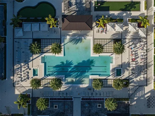 an aerial view of houses with yard