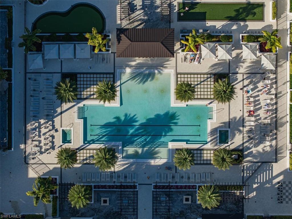 1111 Central Avenue, Unit 401 Naples, FL 34102 - Photo 32 of 36 an aerial view of houses with yard