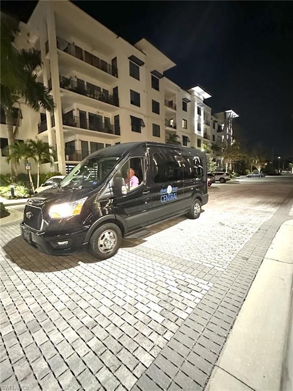 1111 Central Avenue, Unit 401 Naples, FL 34102 - Photo 33 of 36 a view of street with parking