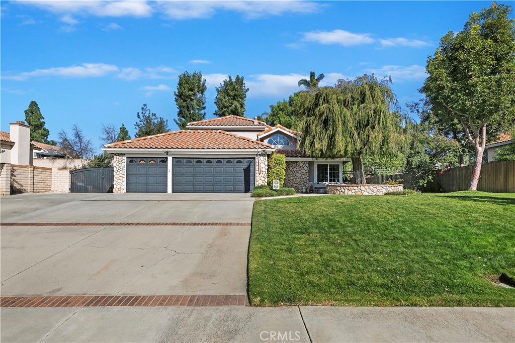 276 Cottonwood Avenue Riverside, CA 92506 - Photo 59 of 69 front view of a house with a garden