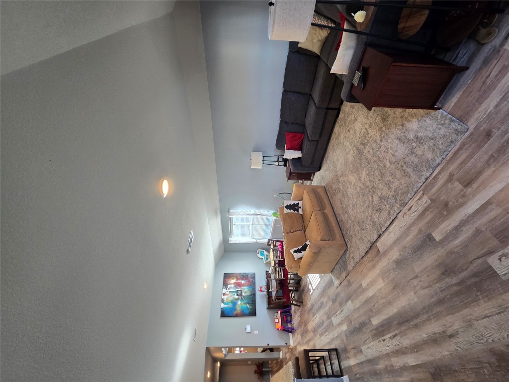 444 Hunter Loop Bertram, TX 78605 - Photo 6 of 15 a living room with furniture and a couch