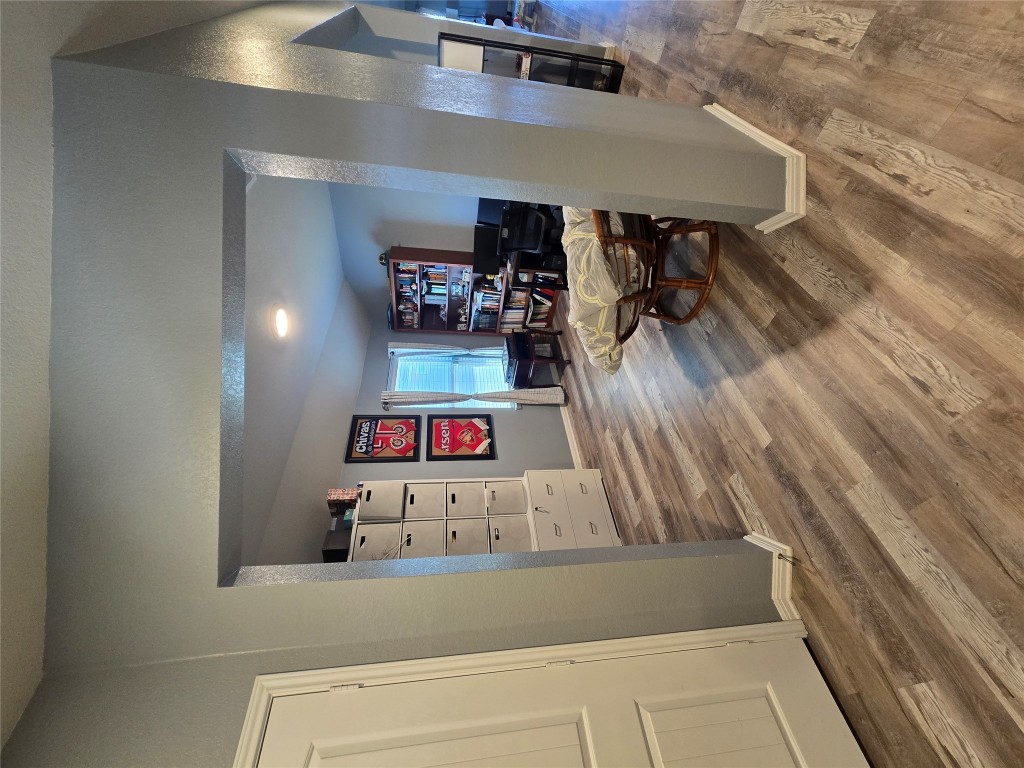 444 Hunter Loop Bertram, TX 78605 - Photo 8 of 15 a living room with furniture and a flat screen tv